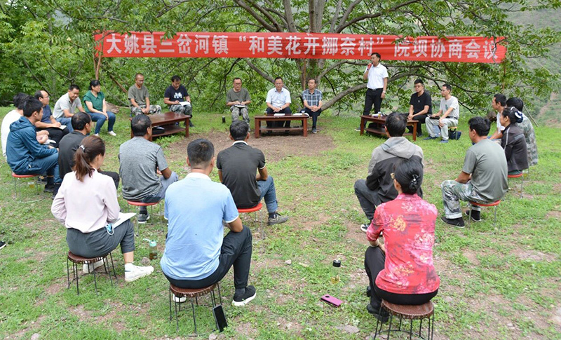 院坝协商为基层治理解难题。